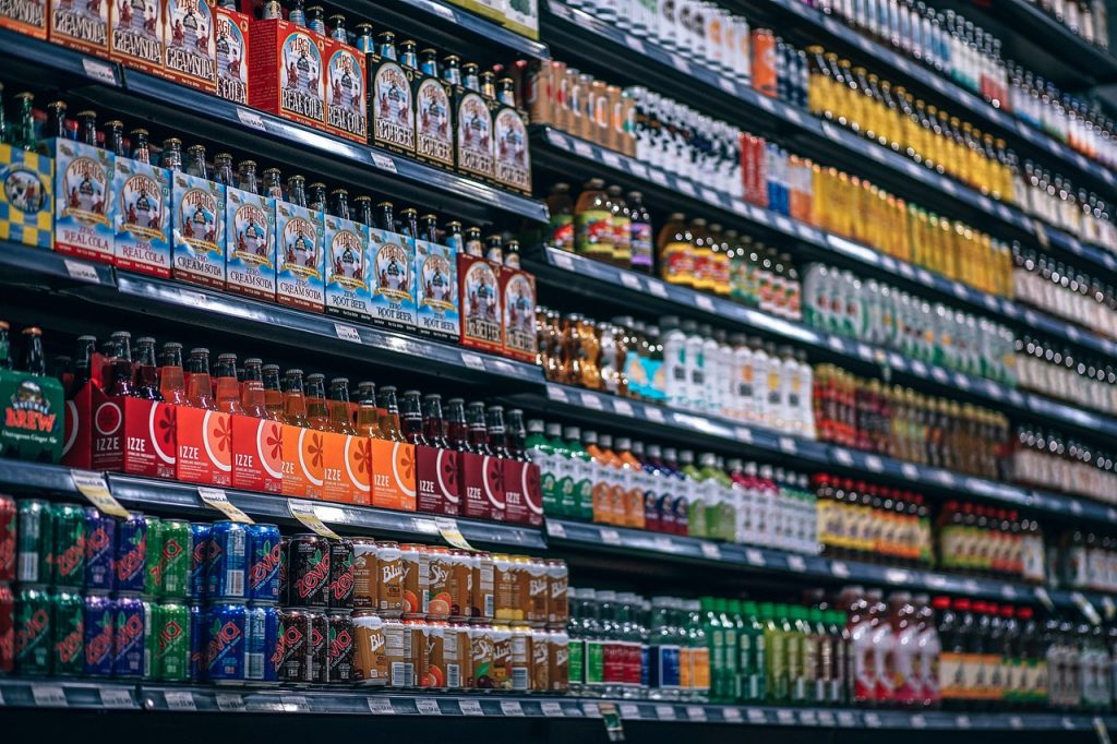 beverages bottles shelf cans coke 3105631