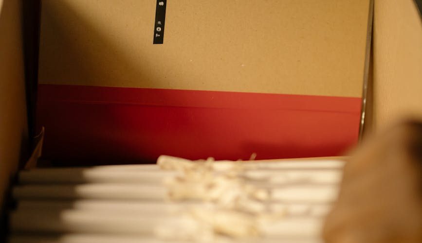 close up shot of a person holding files